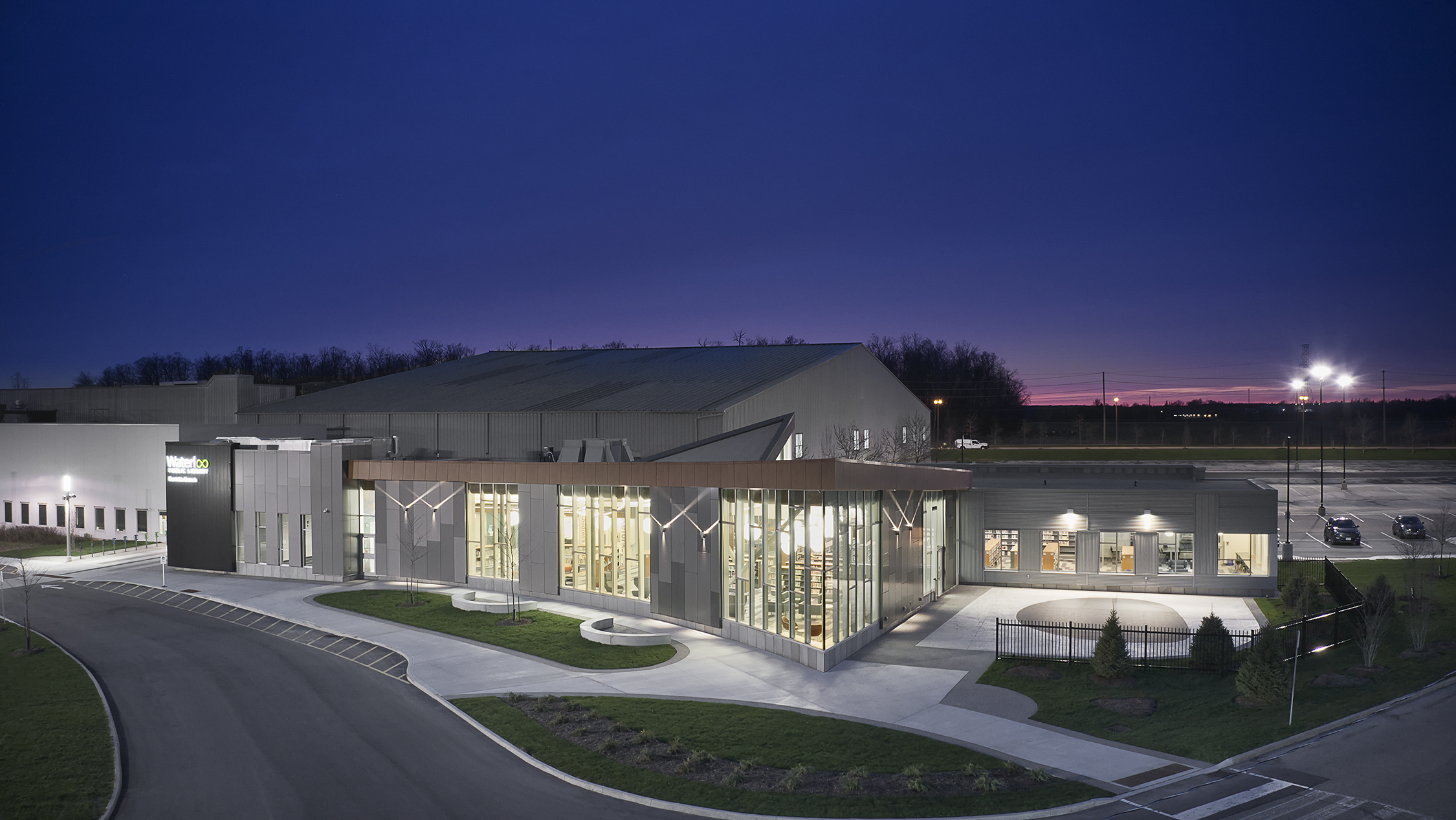 Image of the outside of the Eastside Branch at night